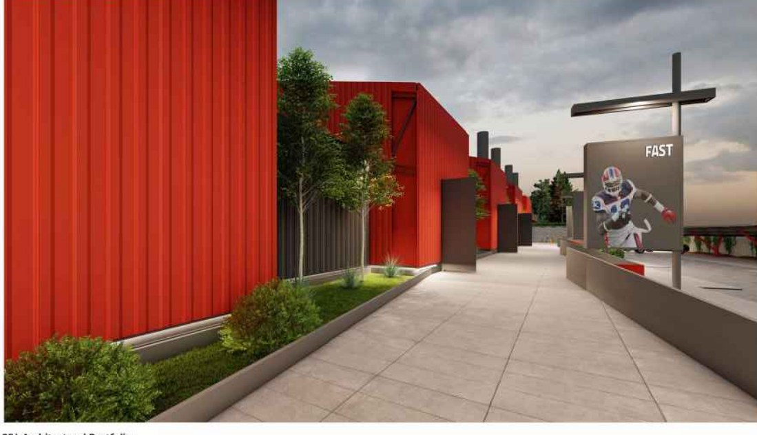 Red corrugated façade along the walkway